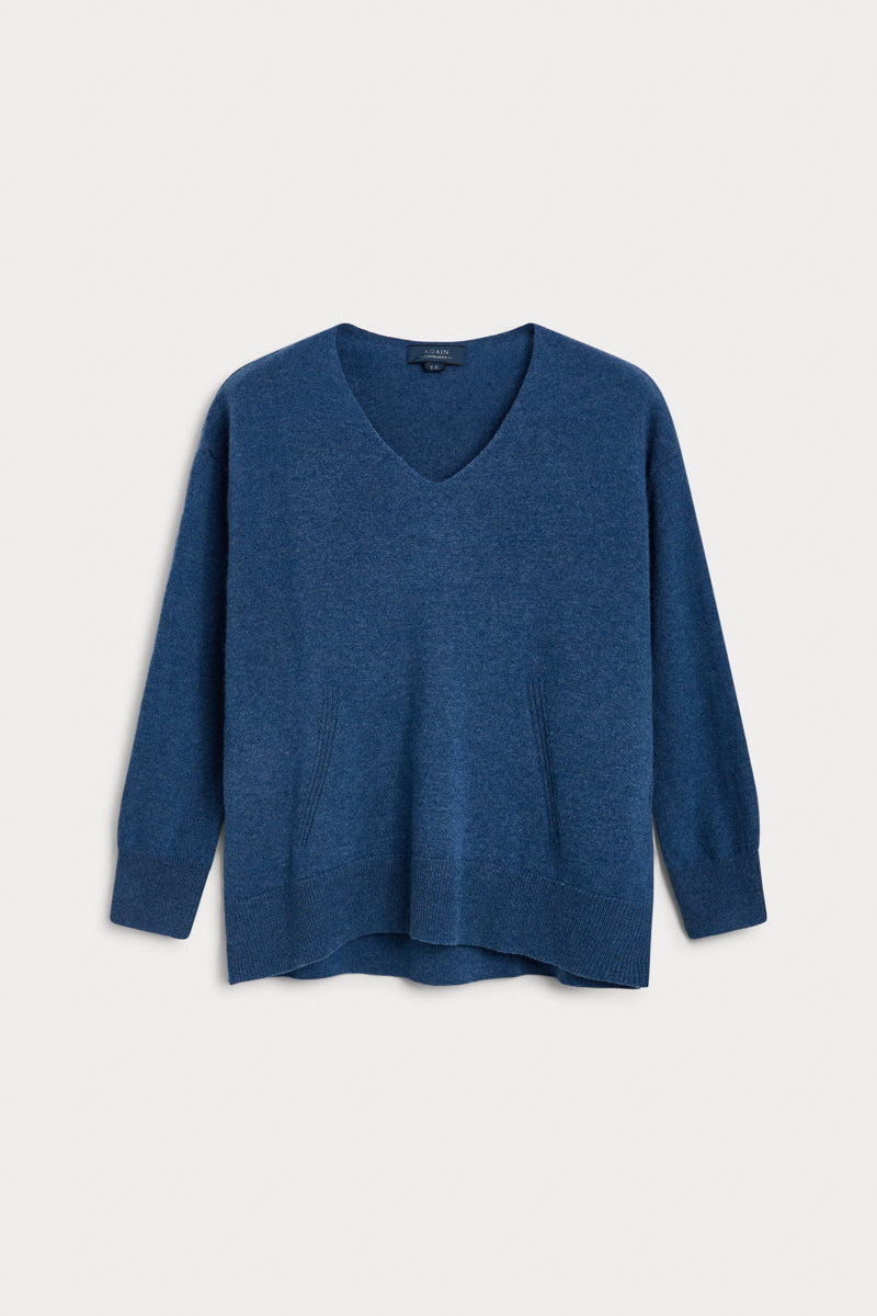 jersey pico oversize cashmere azul medio. AGAIN Cashmere, expertos en fibras naturales.