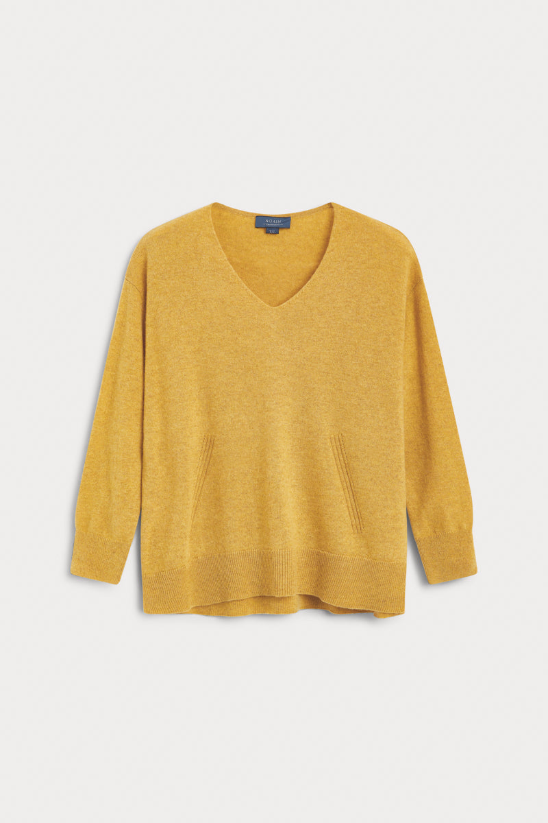 jersey pico oversize cashmere mostaza. AGAIN Cashmere, expertos en fibras naturales.