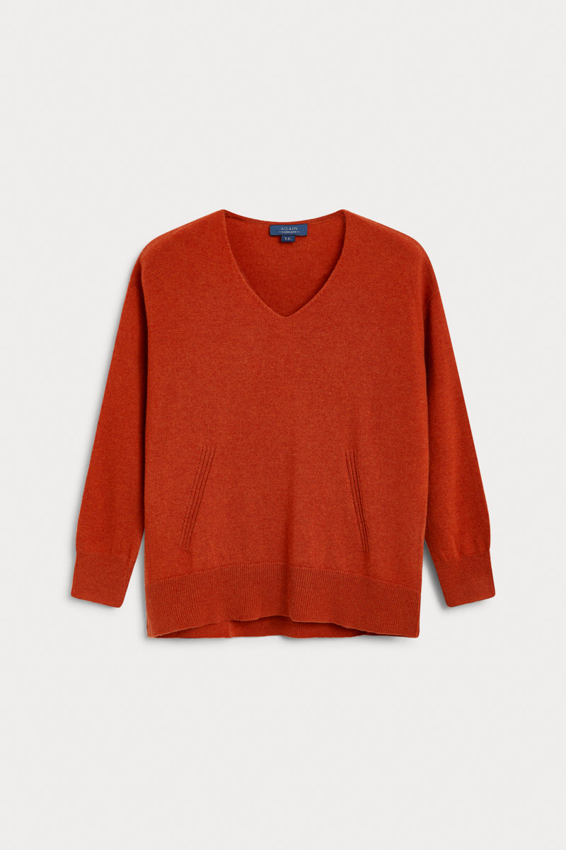 jersey pico oversize cashmere naranja. AGAIN Cashmere, expertos en fibras naturales.