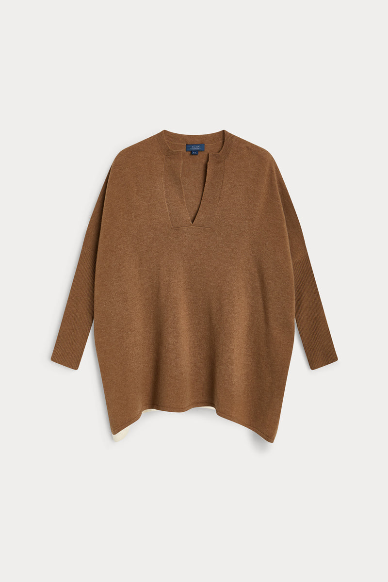 poncho cuello pico cashmere 100%. Again cashmere.