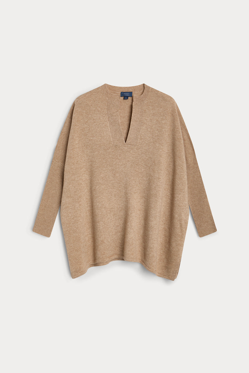 poncho cuello pico cashmere 100%. Again cashmere.