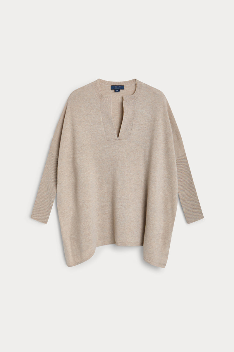 poncho cuello pico cashmere 100%. Again cashmere.